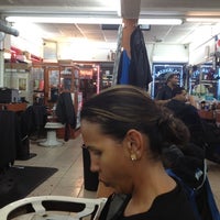 Photo taken at Los Taxistas Barber Shop by John on 12/11/2012