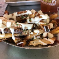 Photo taken at BurgerFi by Colleen D. on 12/23/2018