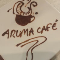 Foto diambil di Aruma Café oleh Gaby E. pada 11/21/2013
