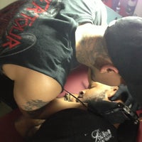 Photo taken at Dave&amp;#39;s tattoo&amp;#39;s by Robert B. on 1/22/2013