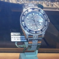 Photo taken at Rolex by Damian S. on 9/20/2012