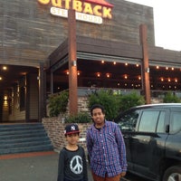 Photo taken at Outback Steakhouse by Mandy C. on 7/10/2013