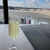 Photo taken at Delta Sky Club by Ross S. on 2/24/2022