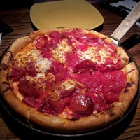 Photo taken at UNO Pizzeria &amp;amp; Grill by Plate P. on 12/17/2012