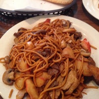 Photo taken at Empire Fire Mongolian Grill by Chris V. on 7/6/2014