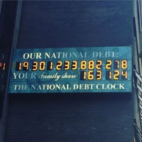 Photo taken at National Debt Clock by Daniel L. on 6/21/2016