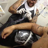 Photo taken at Fink Tattoo by Max S. on 12/8/2012
