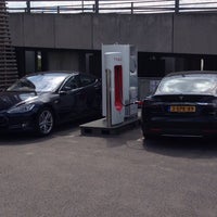 Photo taken at Tesla Supercharger by Jonathan T. on 7/31/2014