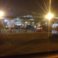 Photo taken at Parkiran Bandar Udara International Seokarno-Hatta by Andree A. on 12/14/2012