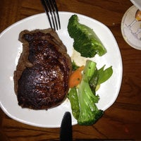 Photo taken at Outback Steakhouse by Станислав Г. on 5/5/2013