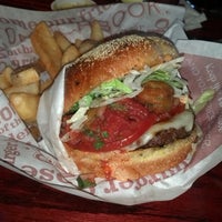Photo taken at Red Robin Gourmet Burgers and Brews by Tom. on 4/28/2013