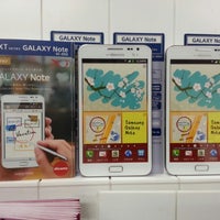 Photo taken at docomo Shop by Yutaka K. on 12/6/2012