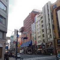 Photo taken at 東京ミッドタウン前交差点 by Kosuke O. on 12/14/2012