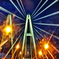 Photo taken at Bolshoy Obukhovsky Bridge (Cable-stayed bridge) by Максим on 6/12/2013