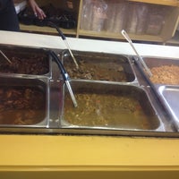 Photo taken at Golden Krust Caribbean Restaurant by Tisha J. on 12/8/2012