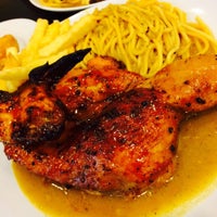 Photo taken at Robin&amp;#39;s Portuguese Chicken by Dhilah S. on 11/29/2015