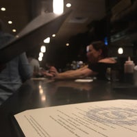 Photo taken at Slate Bar &amp;amp; Grill by Eric A. on 12/13/2018