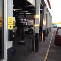 Photo taken at Midas by Jay S. on 10/12/2013