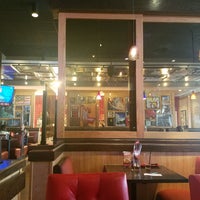 Photo taken at Red Robin Gourmet Burgers and Brews by Brian L. on 8/26/2018