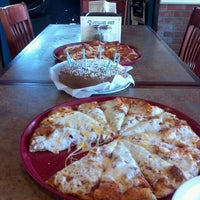 Photo taken at Village Host Pizza by Chris S. on 9/16/2012