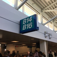 Photo taken at Gate F16 by Jonathan W. on 6/26/2016