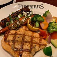 Photo taken at Firebirds Wood Fired Grill by Elvan S. on 12/12/2023