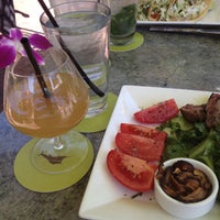 Photo taken at Tommy Bahama Restaurant &amp;amp; Bar by Erin H. on 4/19/2013