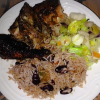 Photo taken at Jerk Hut Jamaican Grille by Jordan C. on 1/19/2014