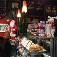 Photo taken at Zizzo&amp;#39;s Coffeehouse &amp;amp; Wine Bar by Jenni Lynne L. on 12/12/2014