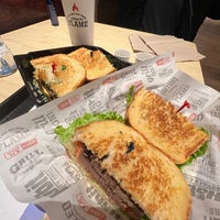Photo taken at The Habit Burger Grill by Alexander S. on 12/3/2022