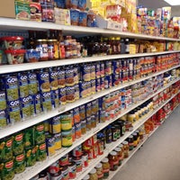 Photo taken at El Mambi Supermercado by Robert T. on 12/20/2013