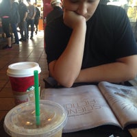 Photo taken at Starbucks by Caitlin . on 12/13/2014