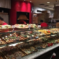 Photo taken at Carluccio&amp;#39;s Coal Fired Pizza by Burcu Y. on 12/17/2017