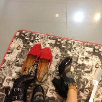Photo taken at ShoeShoe Concept Store by Alexandra L. on 5/4/2013