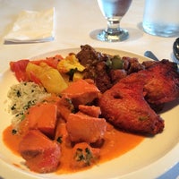 Photo taken at Tadka Indian Restaurant by Kerry C. on 7/16/2014