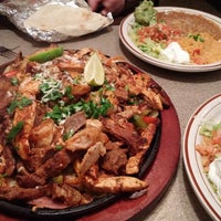 Photo taken at El Potro Mexican Cafe by Amy on 12/3/2014
