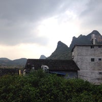Photo taken at Yangshuo Village Inn 阳朔听月楼 by Ellie l. on 2/20/2015