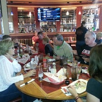 Photo taken at Red Robin Gourmet Burgers and Brews by Monica C. on 7/4/2013