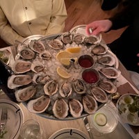 Photo taken at Mermaid Oyster Bar by JAMESON P. on 12/9/2022