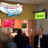 Photo taken at Nathan&amp;#39;s Famous by Michael B. on 2/18/2014