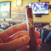 Photo taken at Cigar Towne by Enrique S. on 3/11/2014