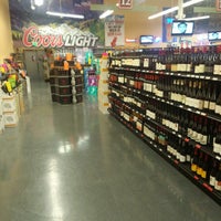 Photo taken at Incredible Wine &amp;amp; Spirits by Alex V. on 7/14/2013