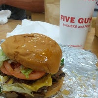 Photo taken at Five Guys by Vicente R. on 10/25/2012