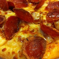 Photo taken at Domino&#39;s Pizza by Caroline on 10/14/2012