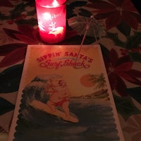 Photo taken at Sippin&amp;#39; Santa&amp;#39;s Surf Shack by Jason S. on 12/22/2016