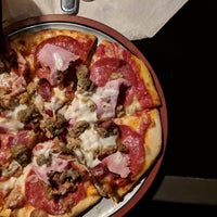 Photo taken at The Rock Wood Fired Pizza by Kimmy G. on 10/28/2018