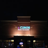 Photo taken at Cumin Indian Restaurant by Brian L. on 11/13/2011