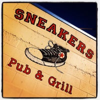Photo taken at Sneakers Pub &amp;amp; Grill by Magnus B. on 11/30/2011