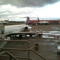 Photo taken at Gate B4 by Russell C. on 12/27/2011