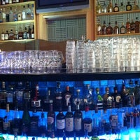 Photo taken at Indigo Restaurant and Bar by Thomas C. on 5/21/2012